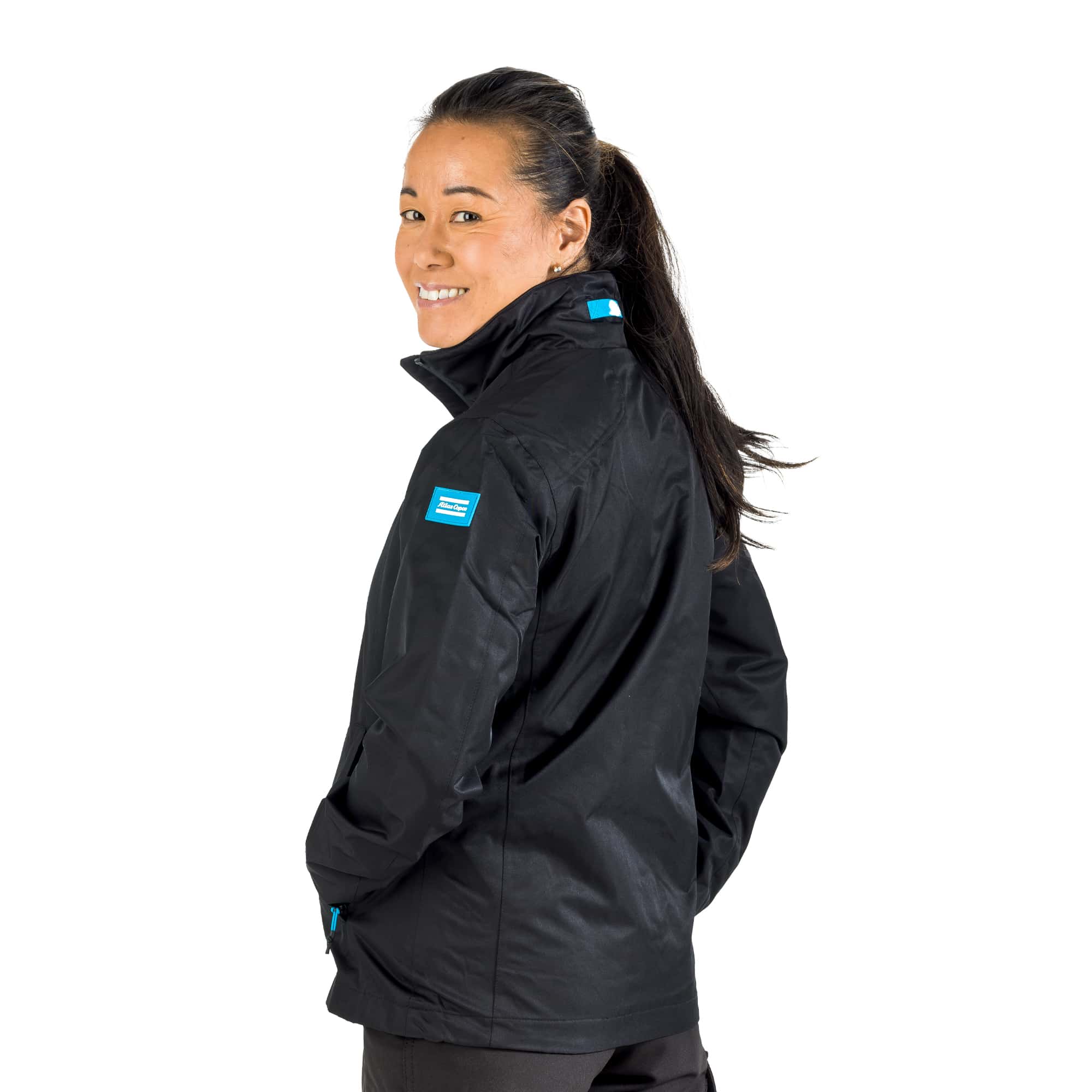 black jacket with atlas copco logo patch on sleeve