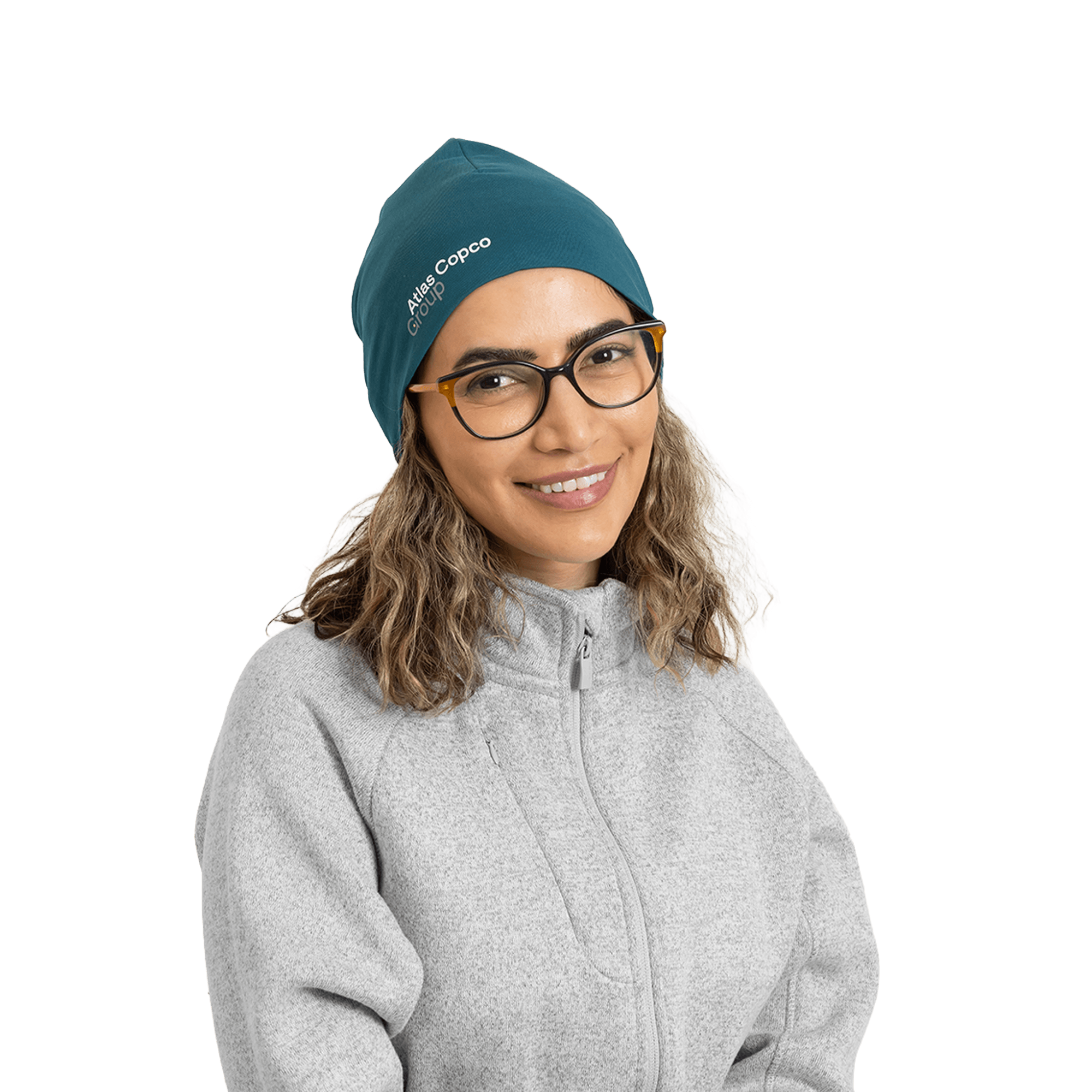 woman wearing teal beanie with atlas copco group logo