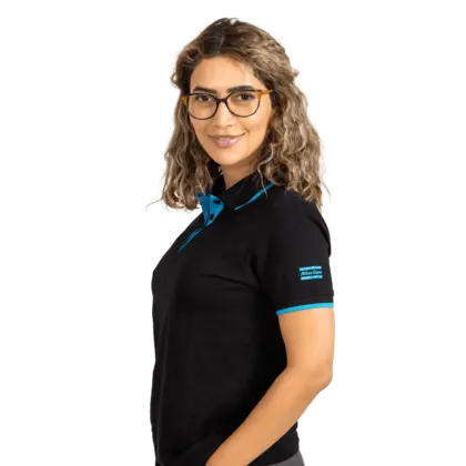 woman wearing black polo shirt with blue details and atlas copco logo on sleeve
